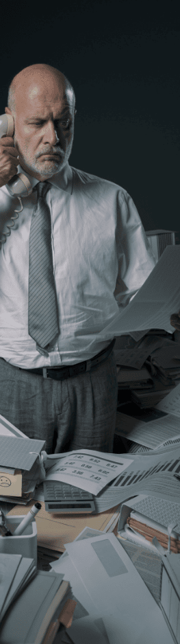 office worker is buried in paperwork